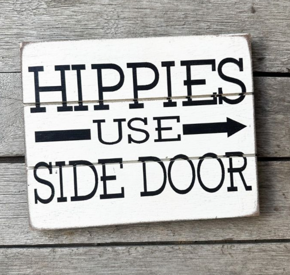 hippies use side door wooden sign