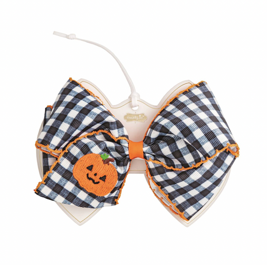 Grosgrain hair bow with embroidered detail.